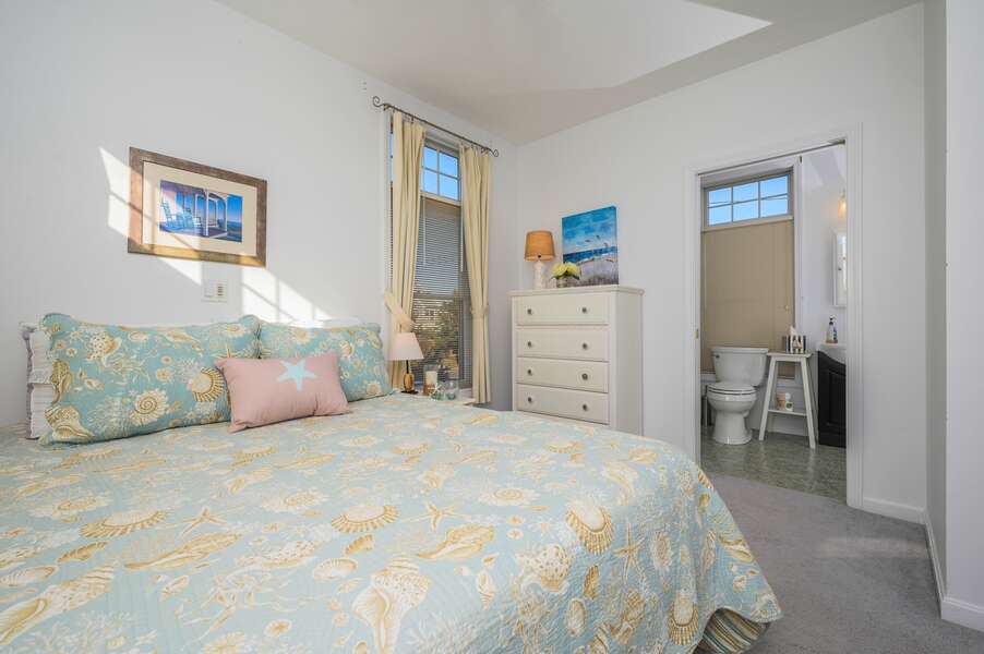 Queen bed on First floor with dresser and entrance to full Bathroom. 27 Fiddlers Green Lane-Dennis Port-New England Vacation Rentals