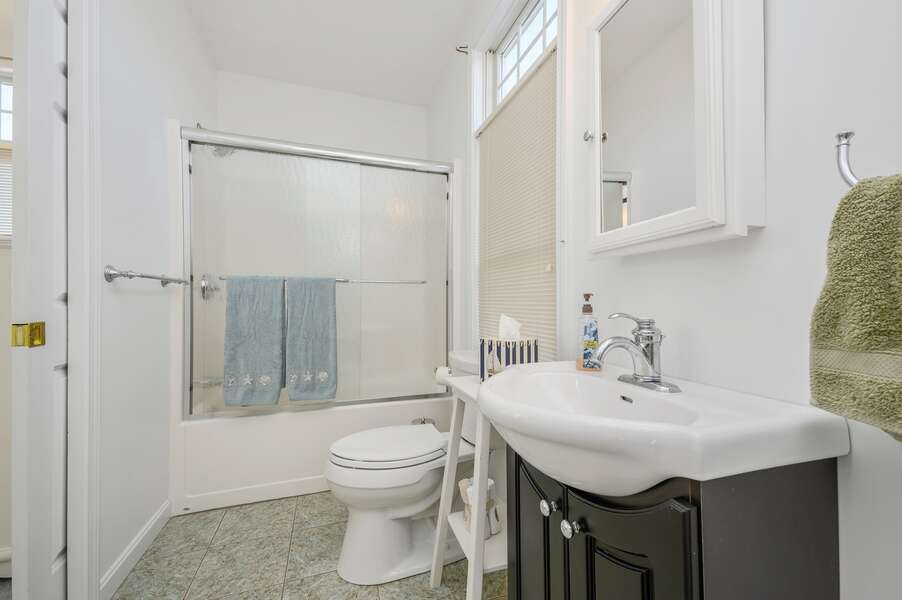 Full bath with tub / shower combo with entrance to both the bedroom and hallway.27 Fiddlers Green Lane-Dennis Port-New England Vacation Rentals