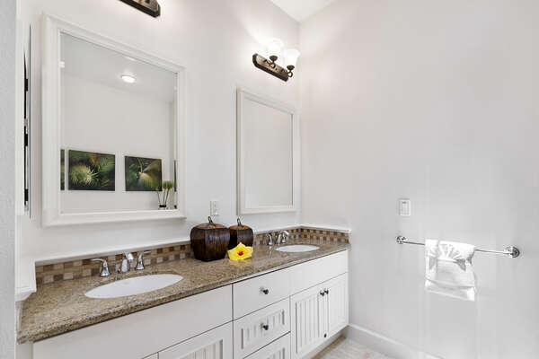 Bathroom with Double Sinks, and Mirrors