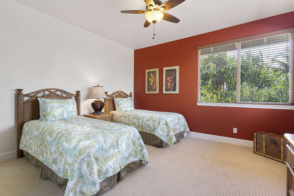 Bedroom with Two Beds and Ceiling Fan