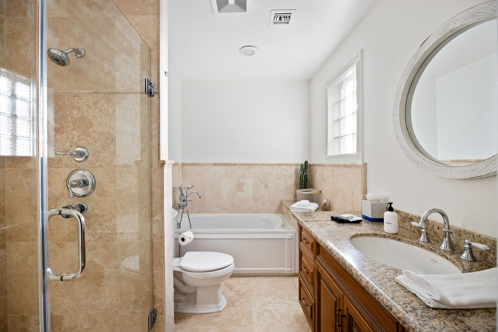 Main Suite Bathroom w/ Glass Shower & Large Tub