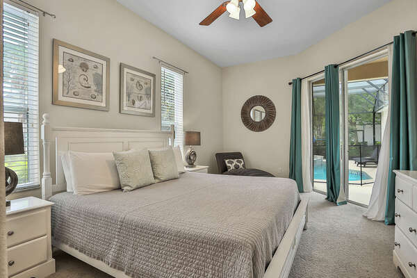 The master suite is located on the ground floor and has access to the outdoor patio