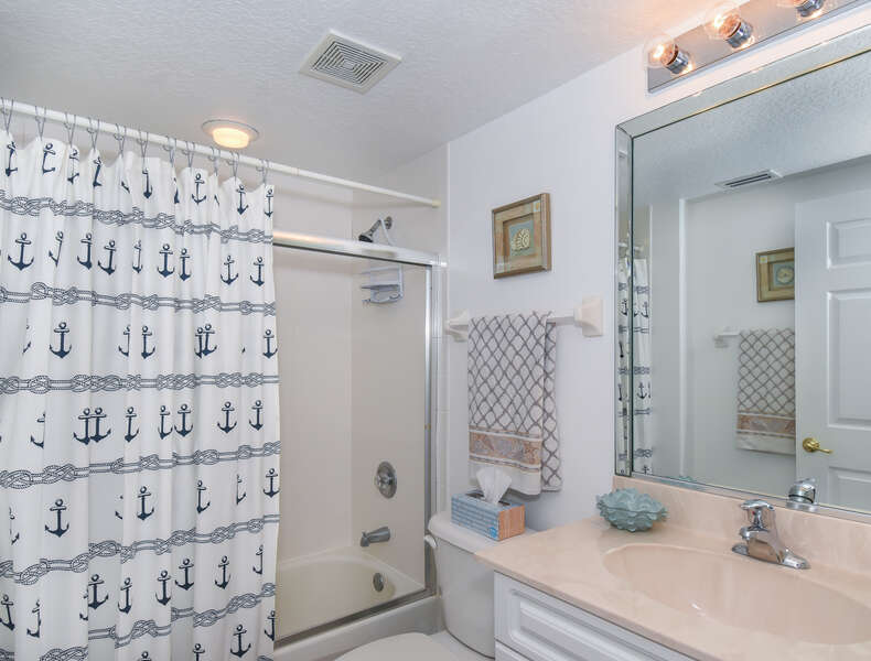 Bathroom with shower-tub combo