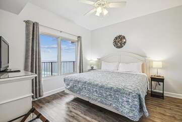 Primary bedroom with gulf view and king size bed