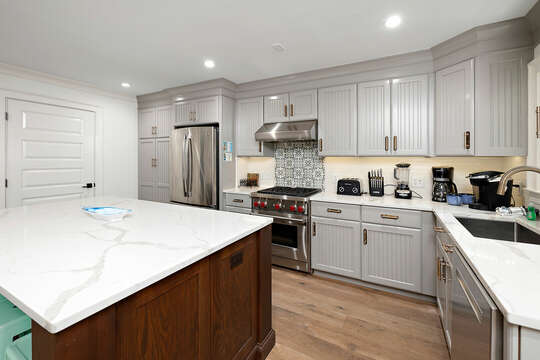 Kitchen with stainless steel appliances and large island