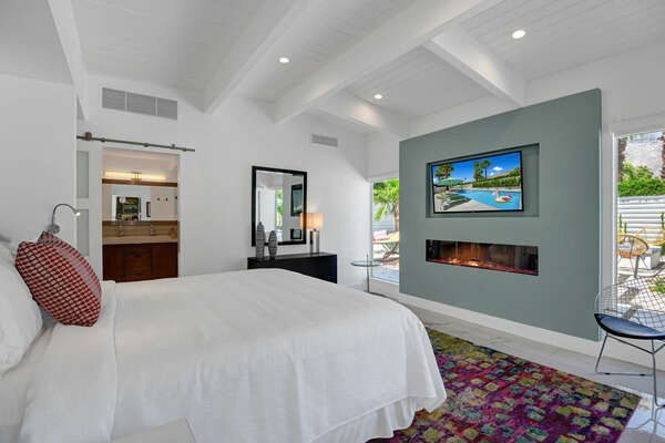 Master bedroom with Smart TV and electric fire place!