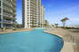 The Community Pool, Lounge Chairs, and the Silver Beach Towers.
