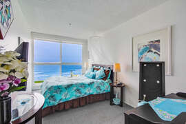 1st Guest Bedroom with queen size bed and ocean views