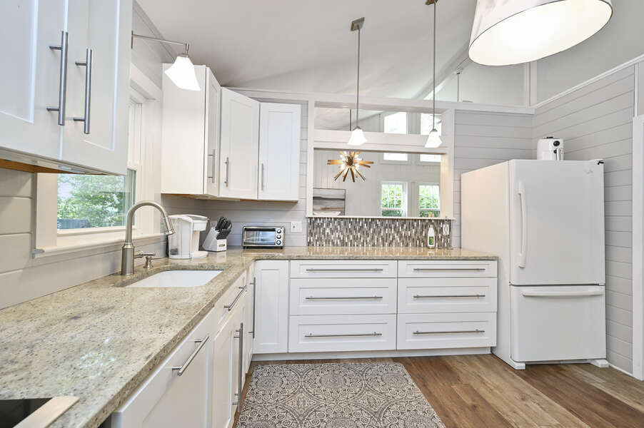 Modern kitchen with open access to dining area - 46 Holly Point Road Centerville Cape Cod