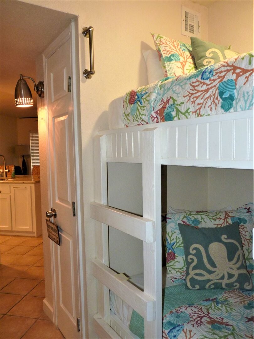 Kids will love these comfortable bunks built right into the wall!