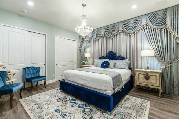 Sleep like a prince or princess in this luxurious master bedroom