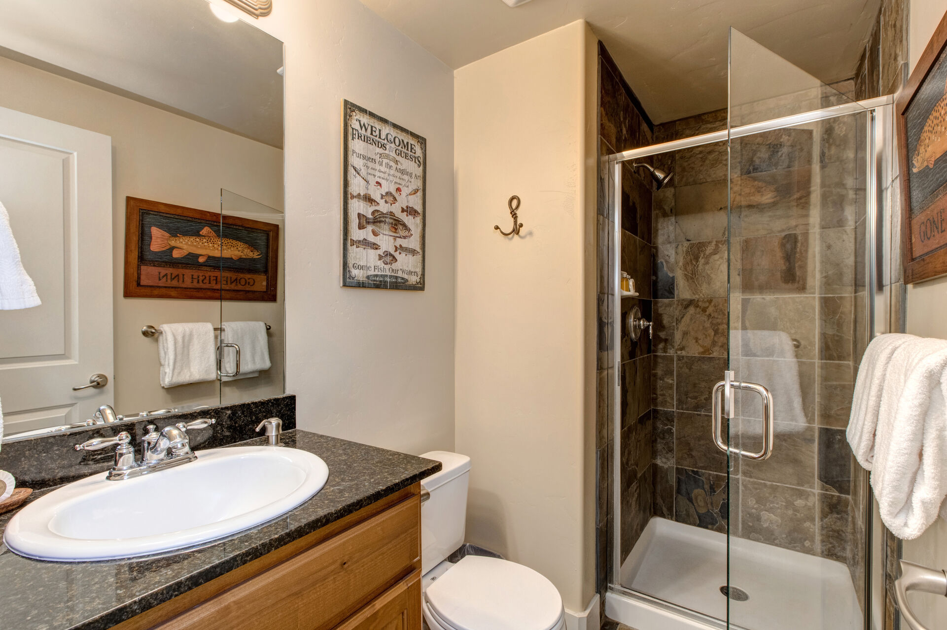 Private Bath with a Granite Counter Sink and Shower