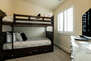 Upper Level Bedroom 4 with  Twin over Twin Bunk Beds & Access to a Full Shared Bath