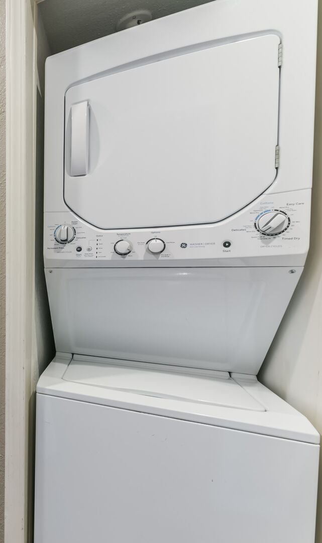 Washer and dryer located next to bunk bed area as you enter