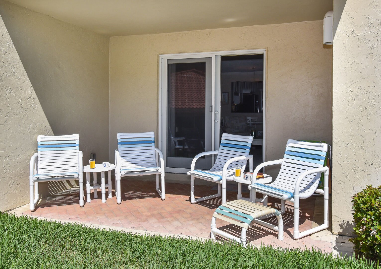 Seating for four on the patio of our New Smyrna Beach oceanfront rental