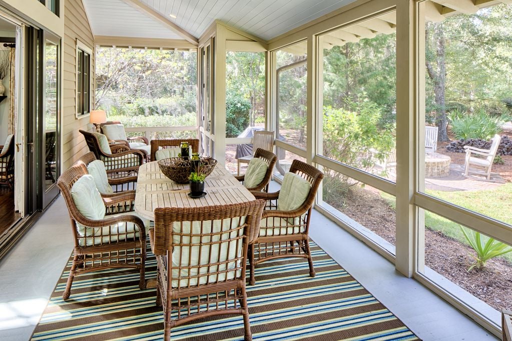 Multiple seating areas in the porch can accommodate large groups