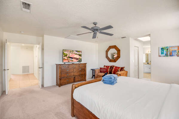 Spacious Master Bedroom with a Smart TV
