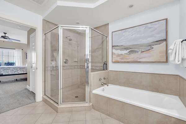 En-suite bathroom with walk in shower and tub.