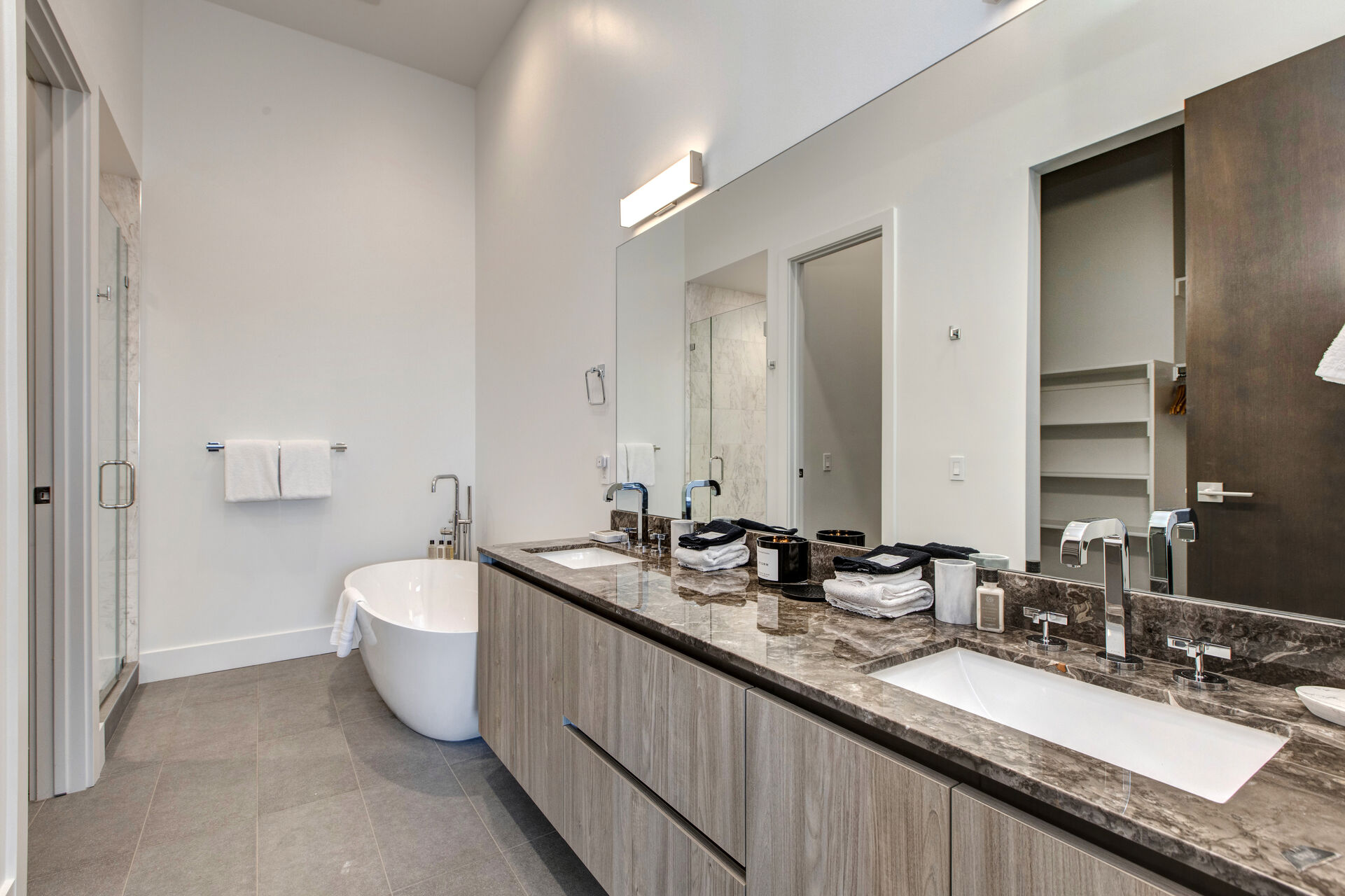 Grand Master Bath with Dual Stone Counter Sinks, a Soaking Tub and Separate Tile/Glass Shower, Walk-in Closet and Water Closet