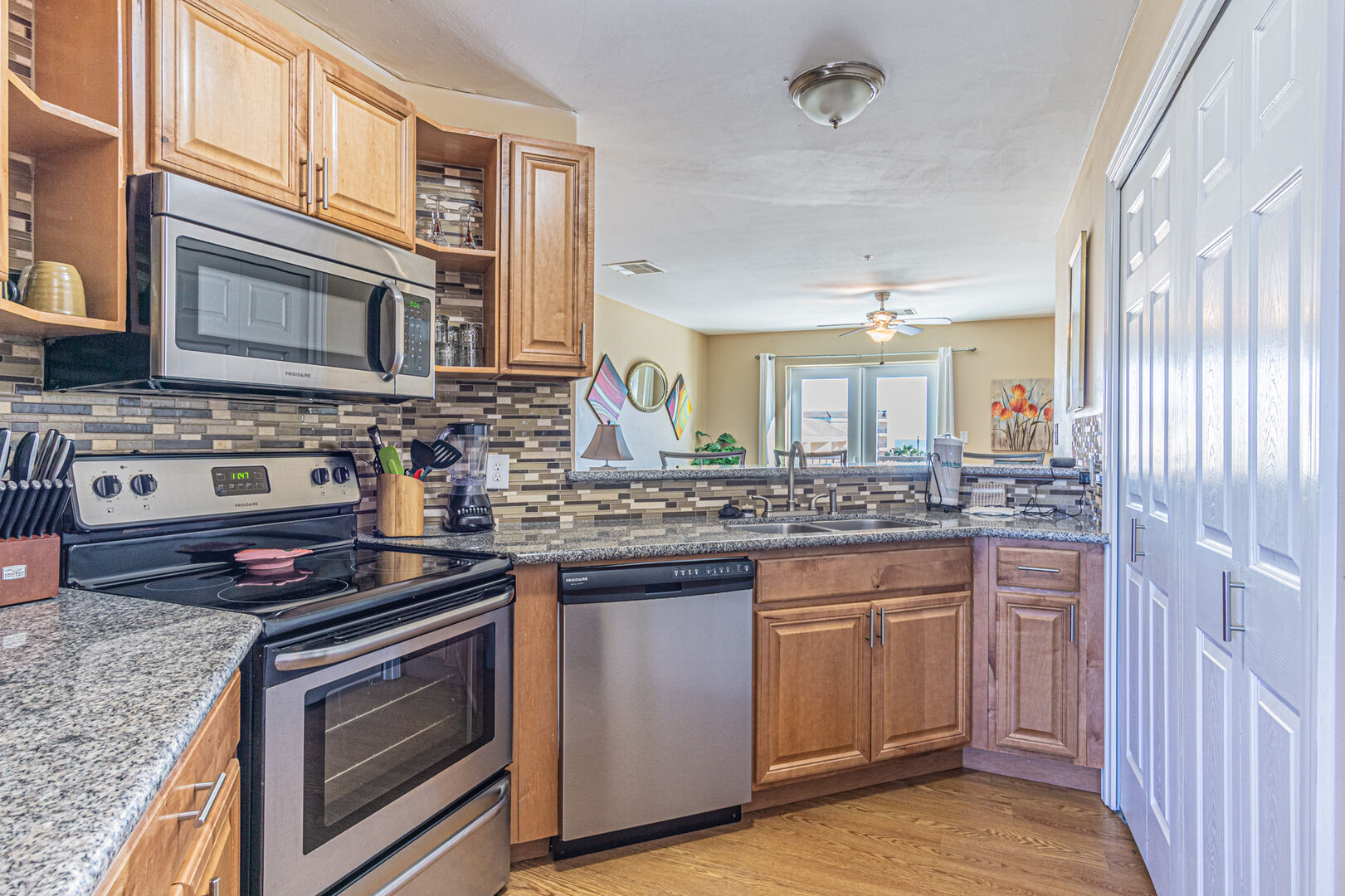 Kitchen fully equipped with full sized appliances and everything a 