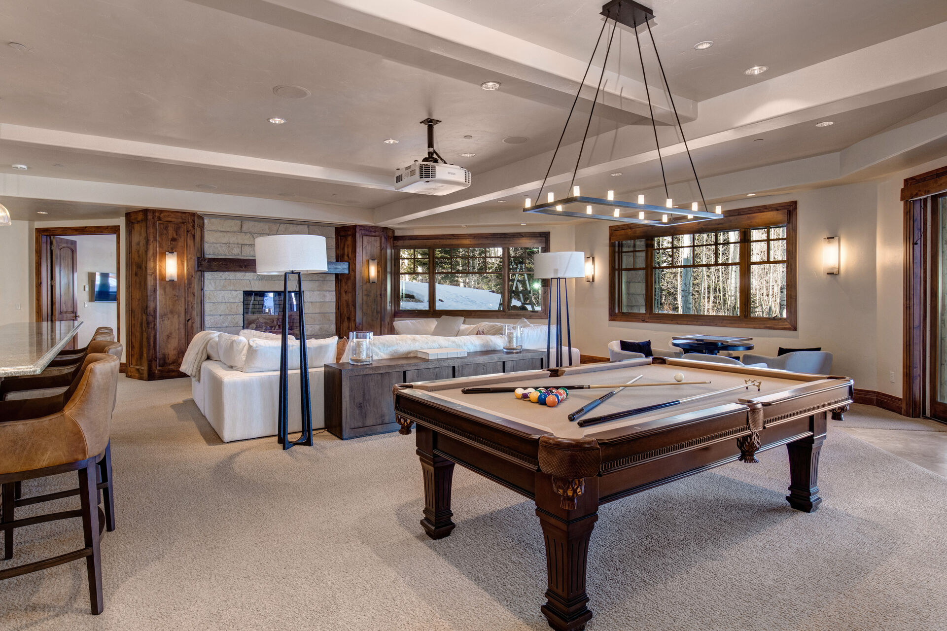 Lower Level Game Area with pool table, bar, and gaming table