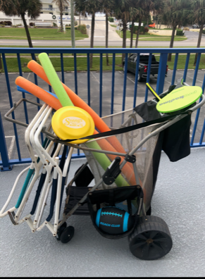 A beach pull buggy with beach toys