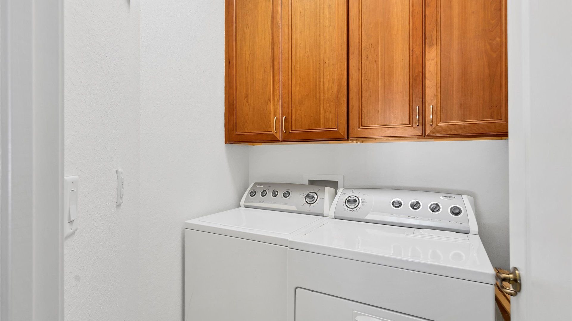 Full Size washer and dryer in laundry room