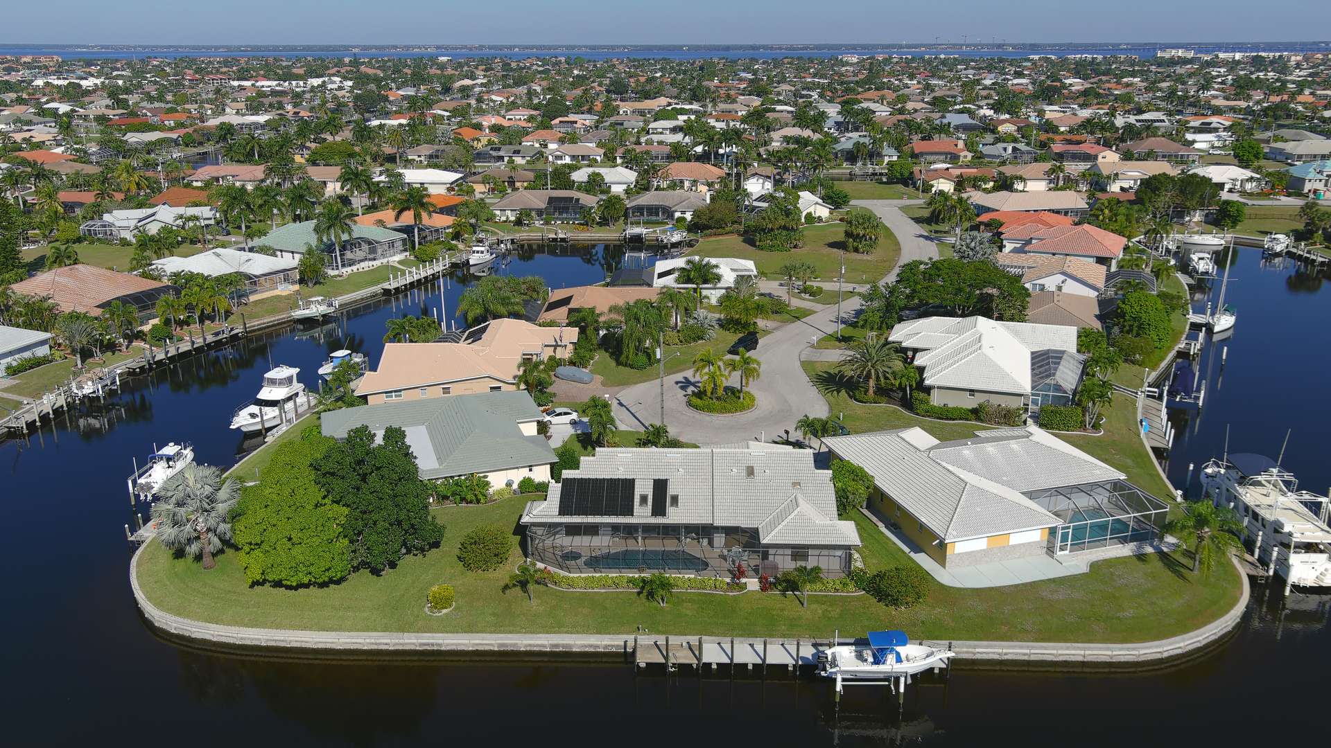 Aerial of the canal and house with dock