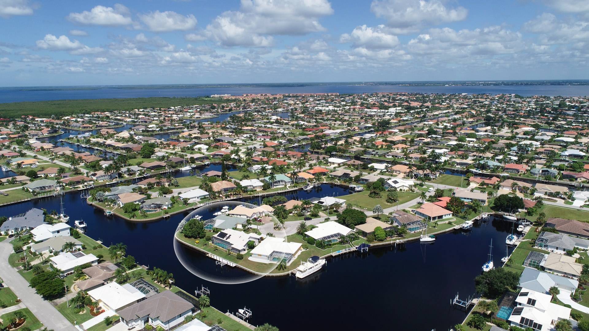 Aerial of the house showing Charlotte Harbor in the nearby distance