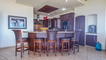Great kitchen Island is a gathering place for casual meals or drinks.