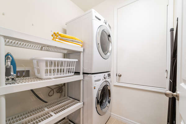 Full size laundry facilities with shelving