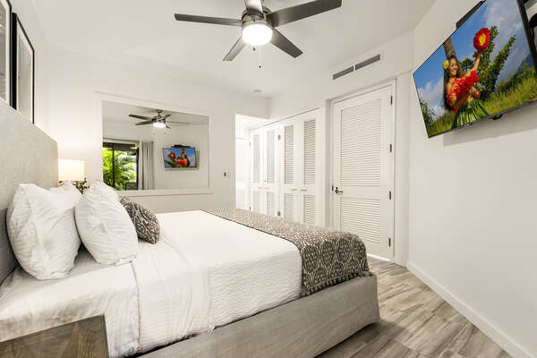 Large Bed, Ceiling Fan, and Smart TV