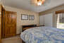 Lower Level Master Bedroom with king bed and en suite bathroom