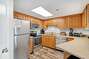 Fully equipped kitchen with updated cabinets, stainless appliances and a breakfast bar