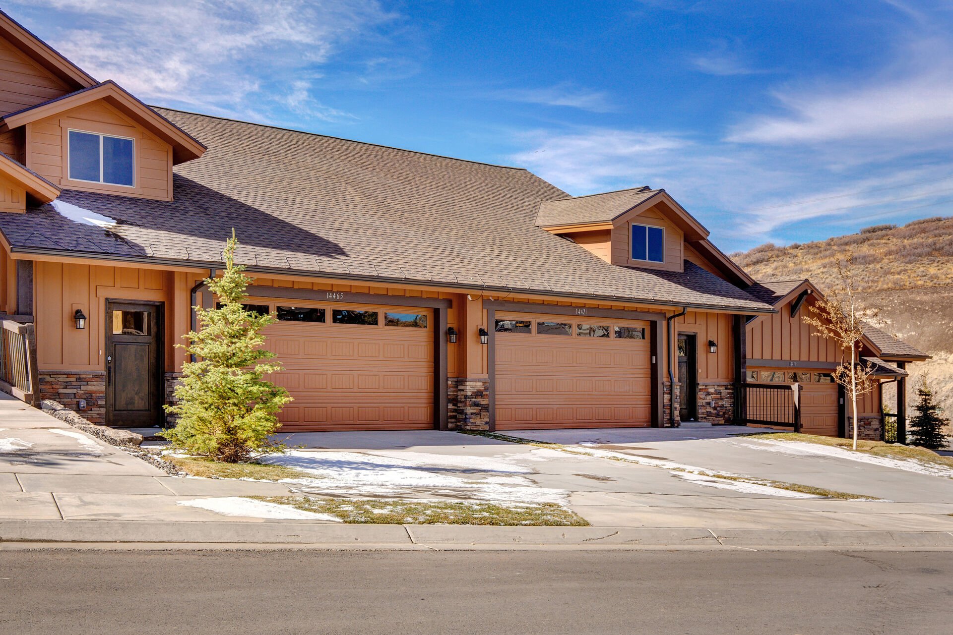 Front Exterior and view of 2-car garage