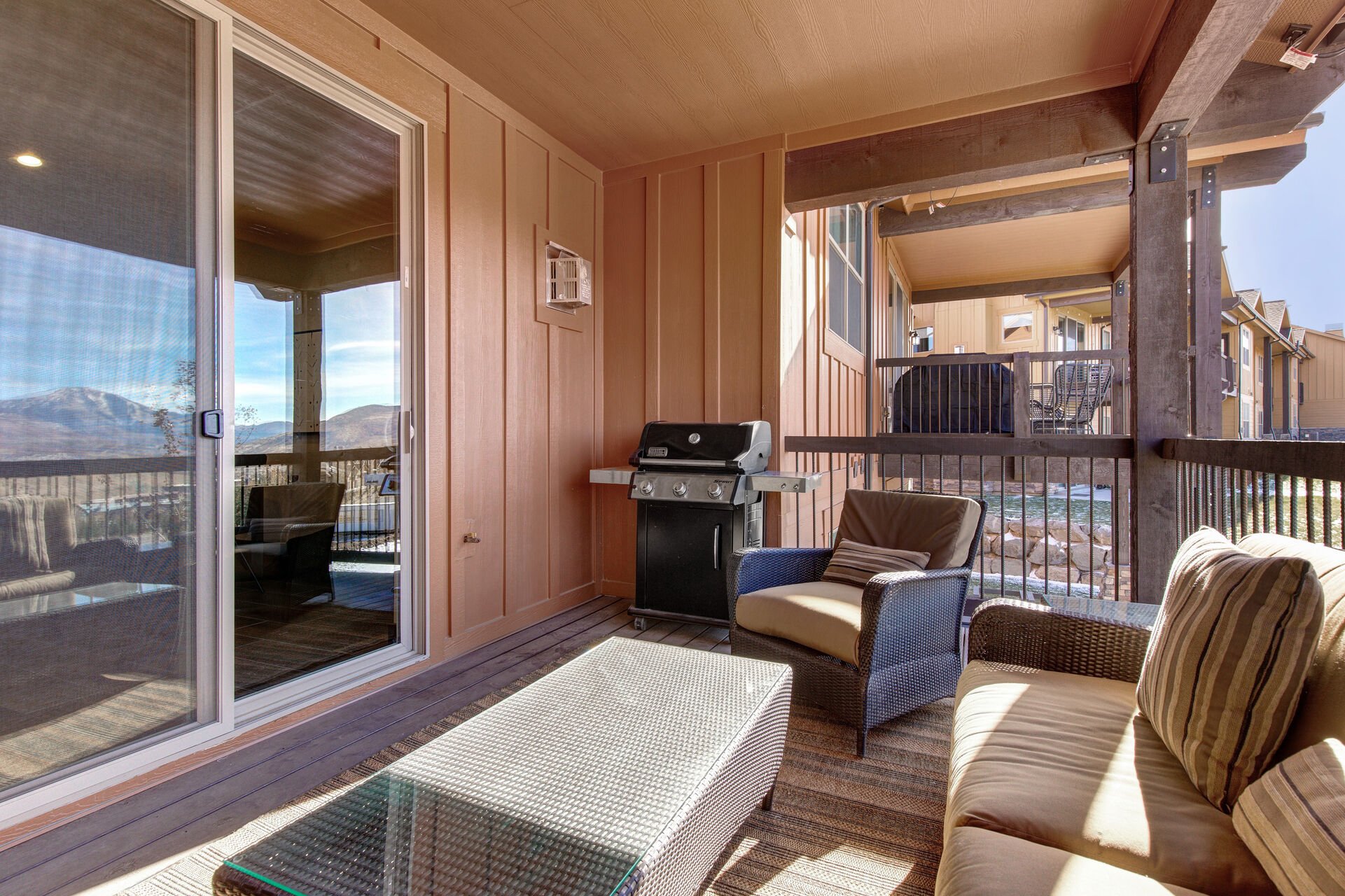 Upper Level Patio with  seating for four, propane bbq, and stunning views of Park City