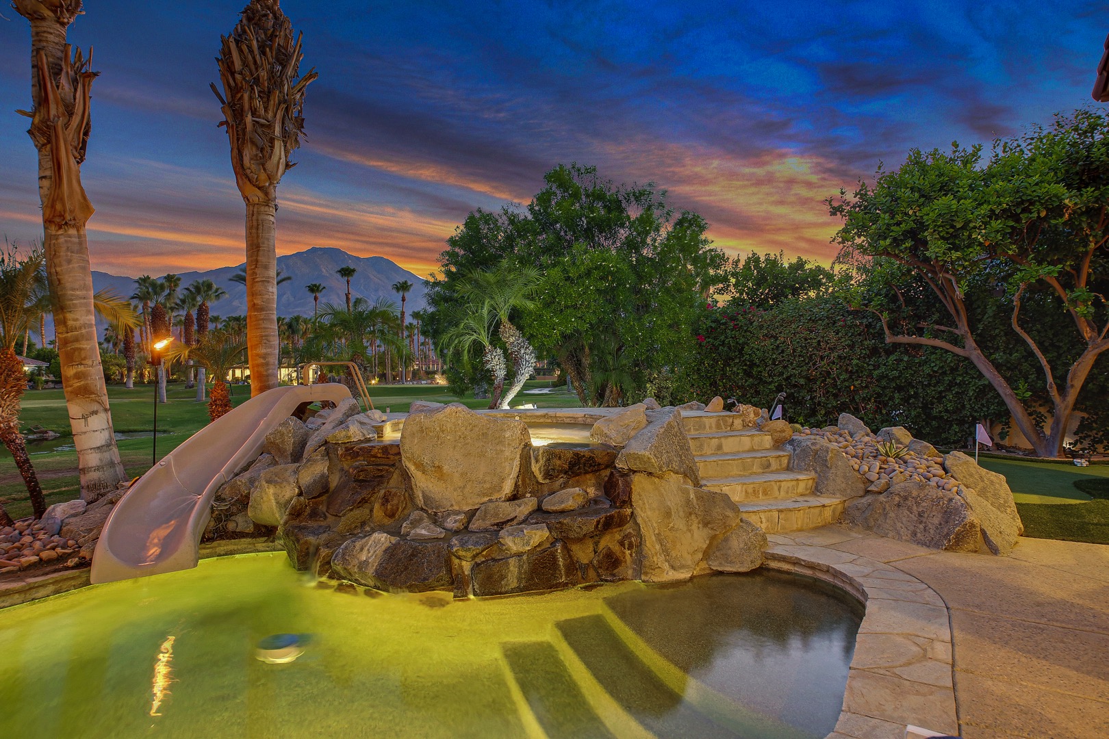 Entertainment for the kids include a fun water slide that dives right into the refreshing pool.
