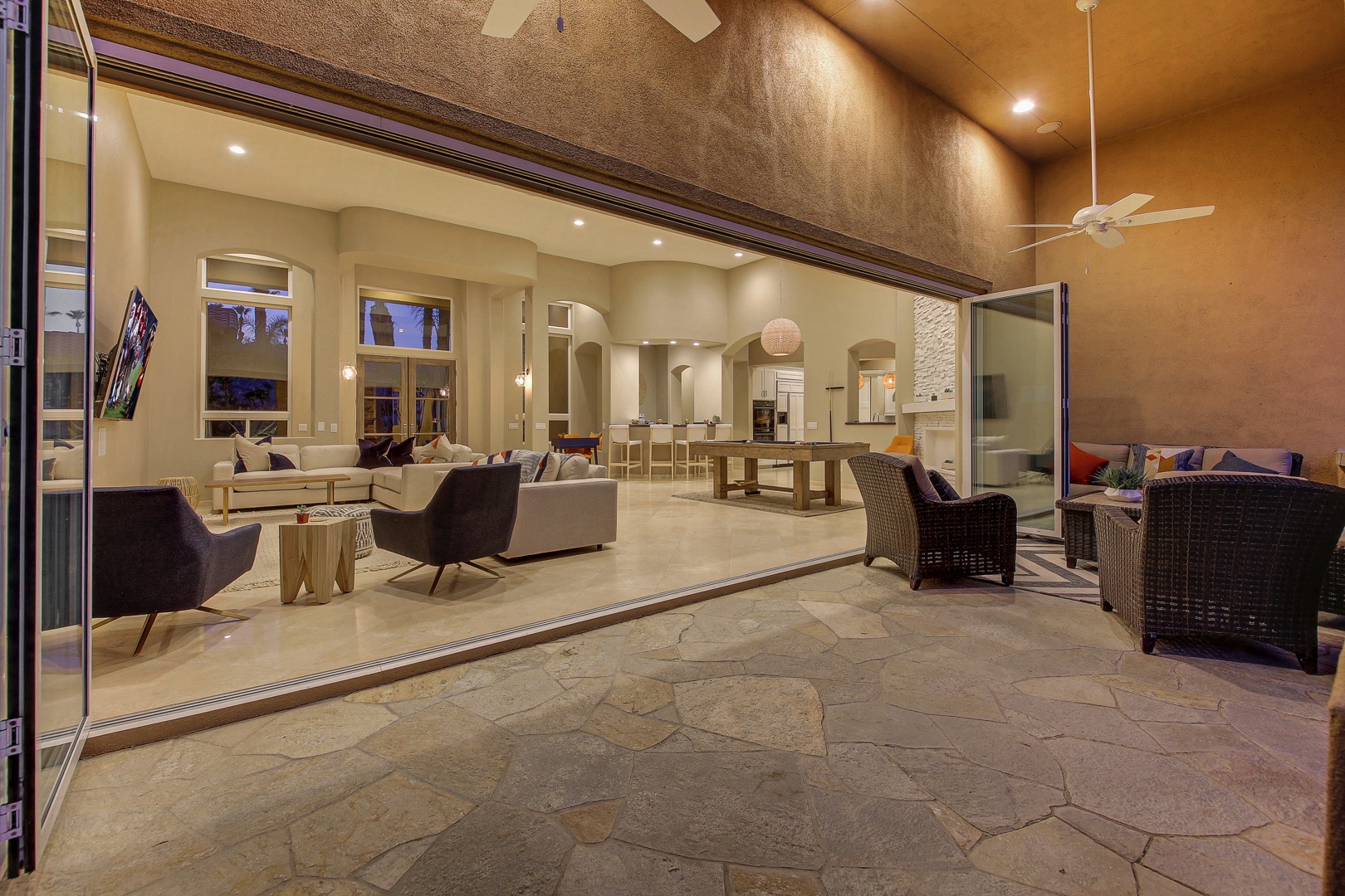 The glass wall makes the living area seem endless!