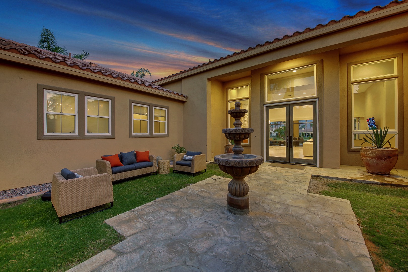 Huge private courtyard with plenty of moveable seating to watch the Bocce Ball tournaments
