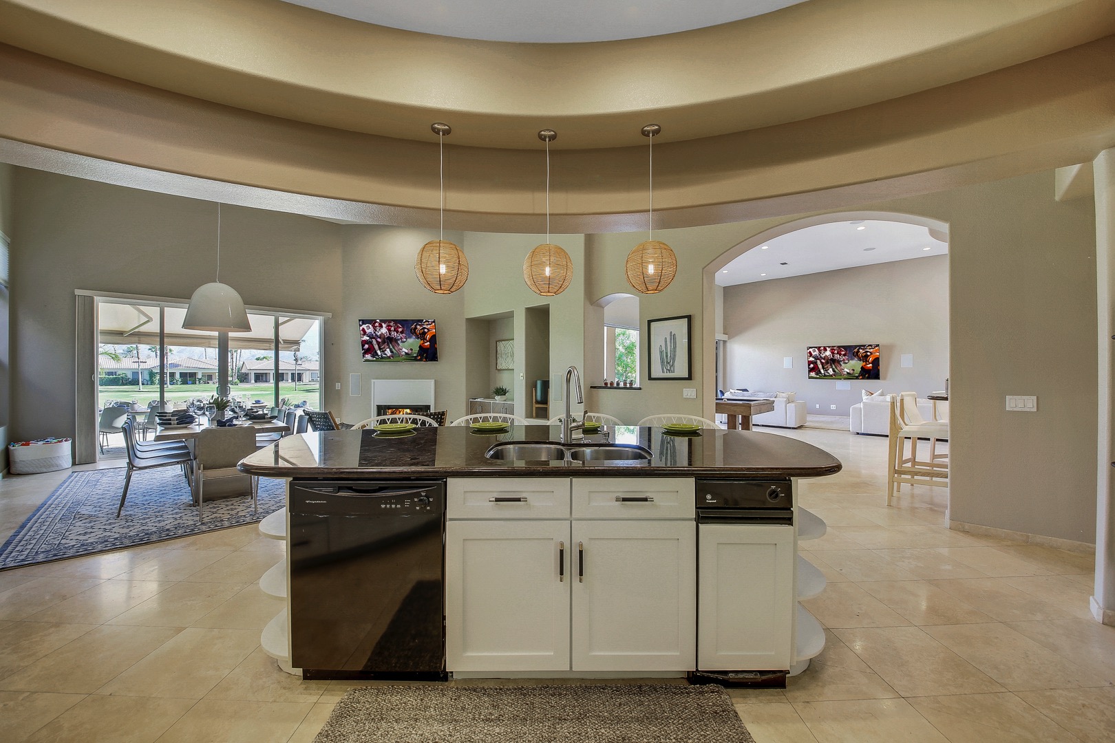 The fully-equipped kitchen is perfectly located next to the dinning room, the open floor plan allows for easy clean-up.