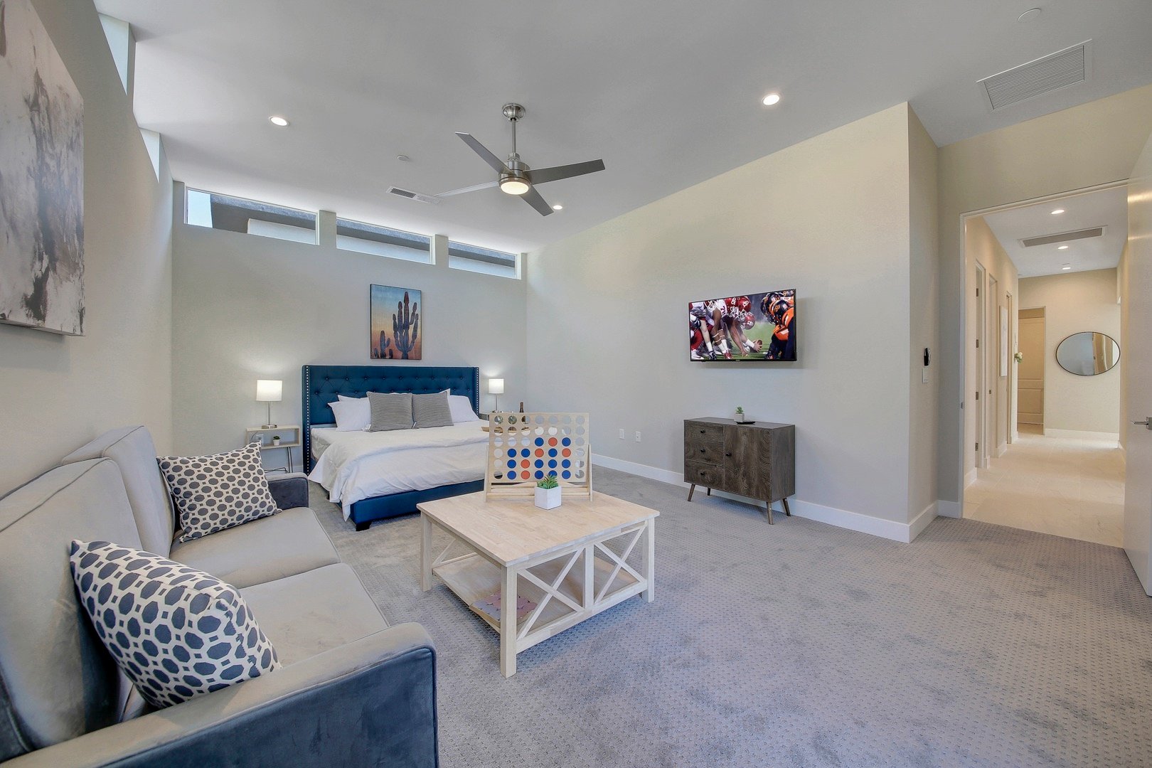 Catch up on your favorite shows, or enjoy a game of Connect 4! The Master Suite is located at the end of the hallway and has direct access to the back patio.