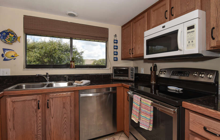 The fully equipped kitchen is fully stocked with everything you'll need to prepare your favorite meal and features stainless steel appliances. 
