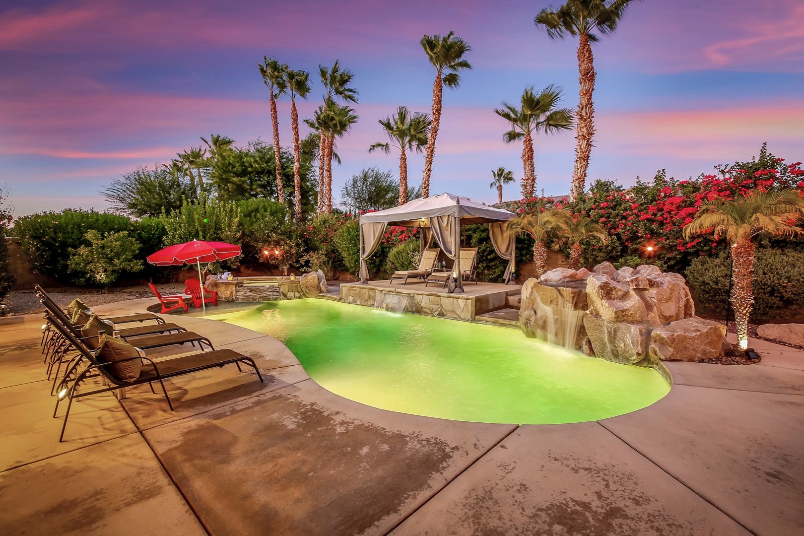 Vacay Stay invites you to unwind and relax in this large backyard with so much room to entertain.