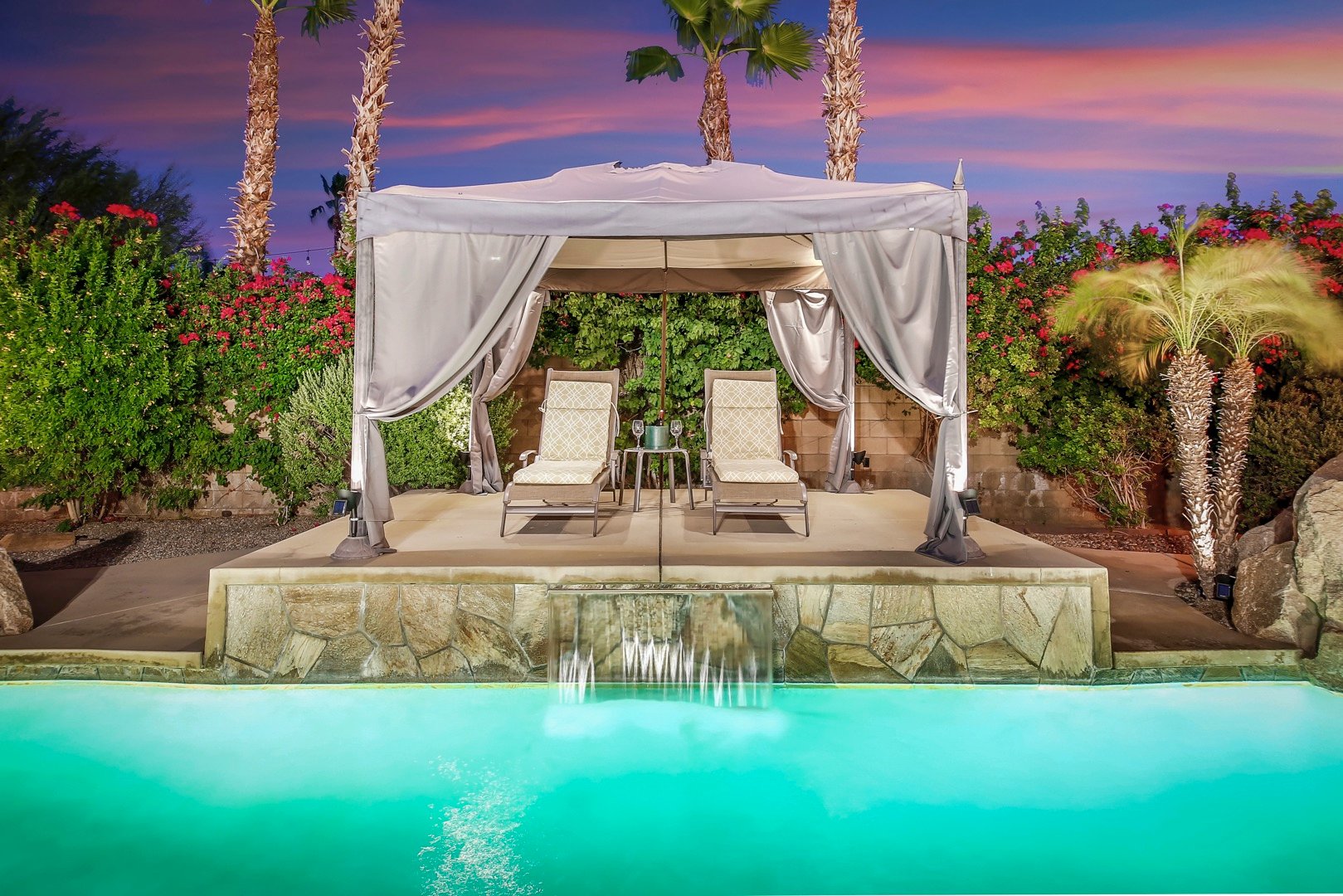 The cabana in the upper landing patio is sure to impress and keep you cool with extra shade.