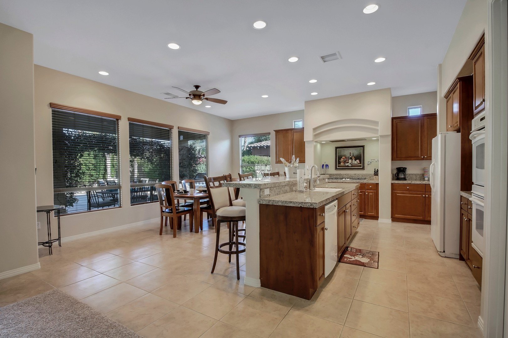 The spacious gourmet kitchen will be fully equipped to cook your favorite meals.