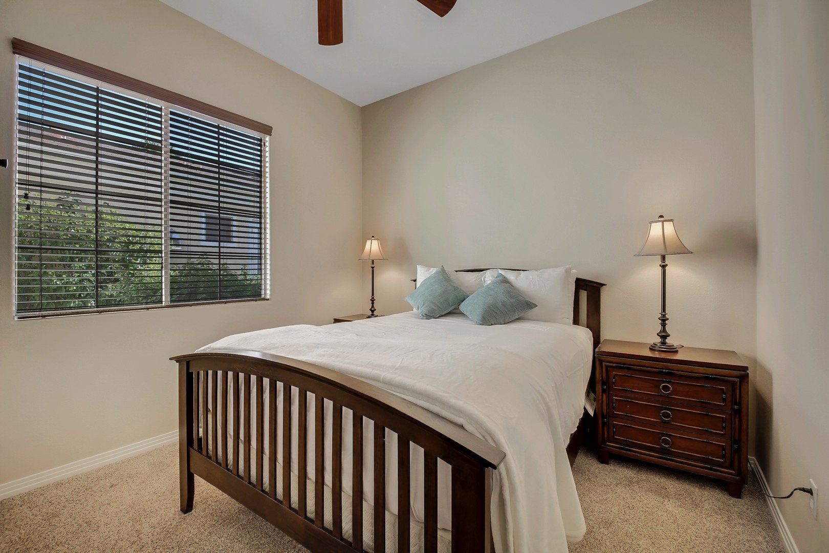 Bedroom 5 is located next to the front door, featuring a Queen-sized Bed and 42-inch TCL by Roku Smart television.