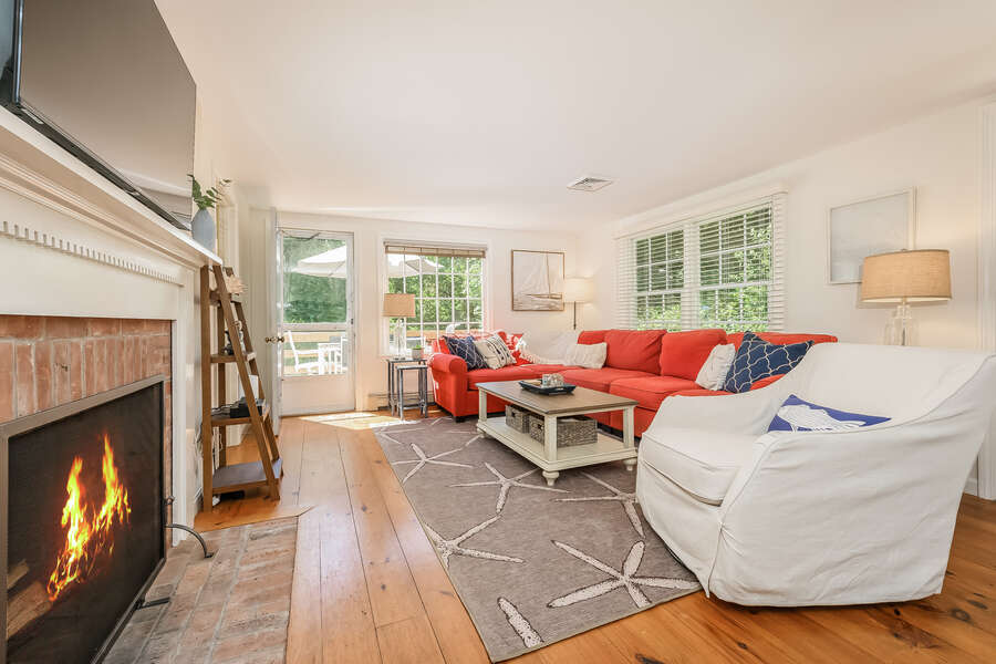 Living room with ample seating and deck entrance- 80 Lienau Dr Chatham Ma - Cape Cod- New England Vacation Rentals