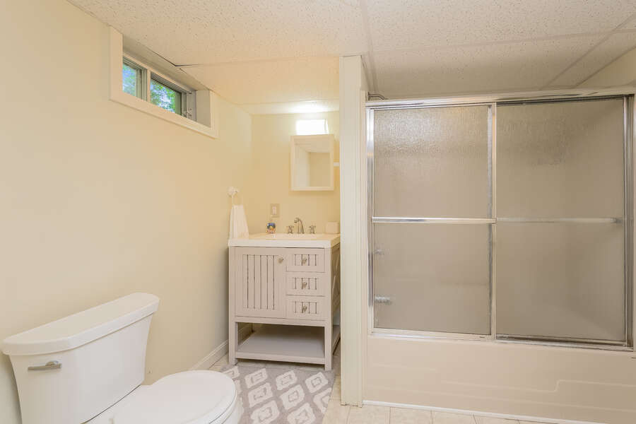 Bath room #3 in finished basement with shower/ tub combo, vanity and toilet. 80 Lienau Dr Chatham Ma - Cape Cod- New England Vacation Rentals