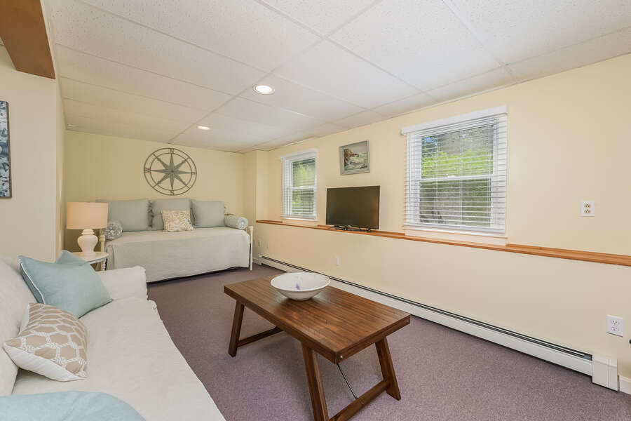 Finished basement with additional couch and day bed with flat screen TV- 80 Lienau Dr Chatham Ma - Cape Cod- New England Vacation Rentals