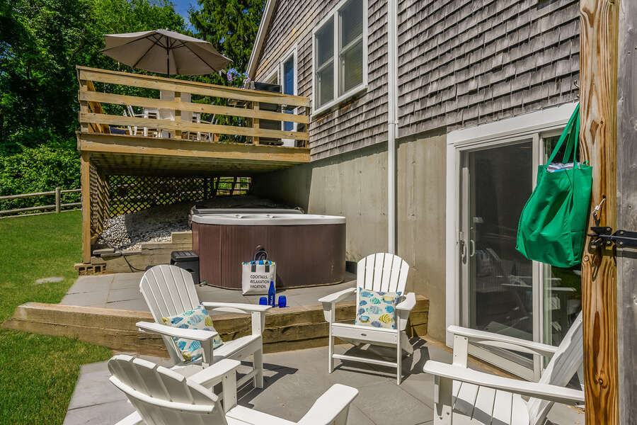 Patio area next to hot tub and out door shower- with seating for 4- 80 Lienau Dr Chatham Ma - Cape Cod- New England Vacation Rentals